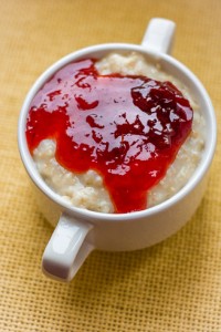 Healthy breakfast - porridge with plum compote